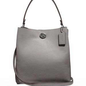 Coach Charlie bucket bag 10 1/2" (L) x 10 3/4" (H) x 6" (W) Smoke free home.